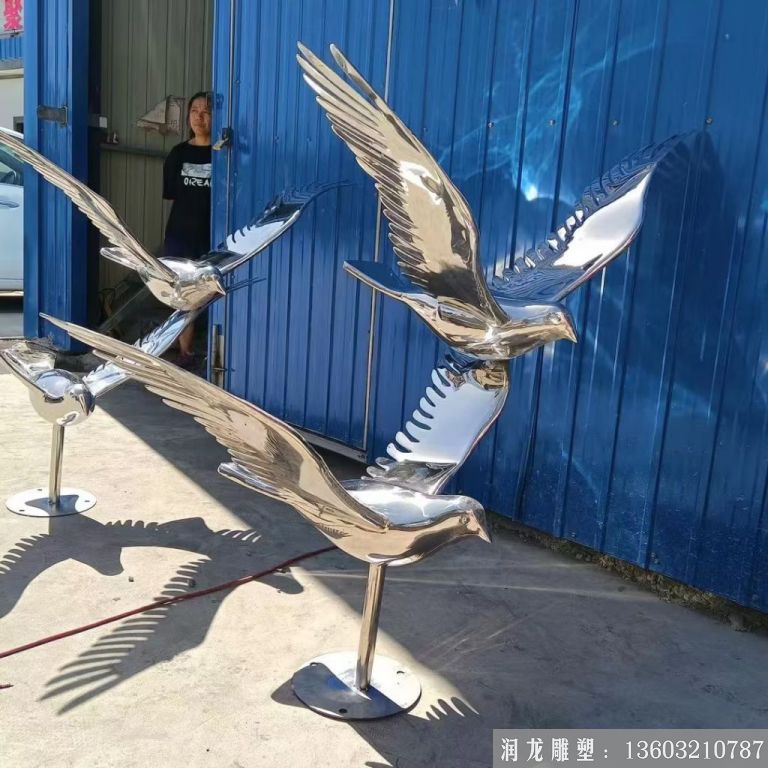 不锈钢镜面飞翔鸽子雕塑